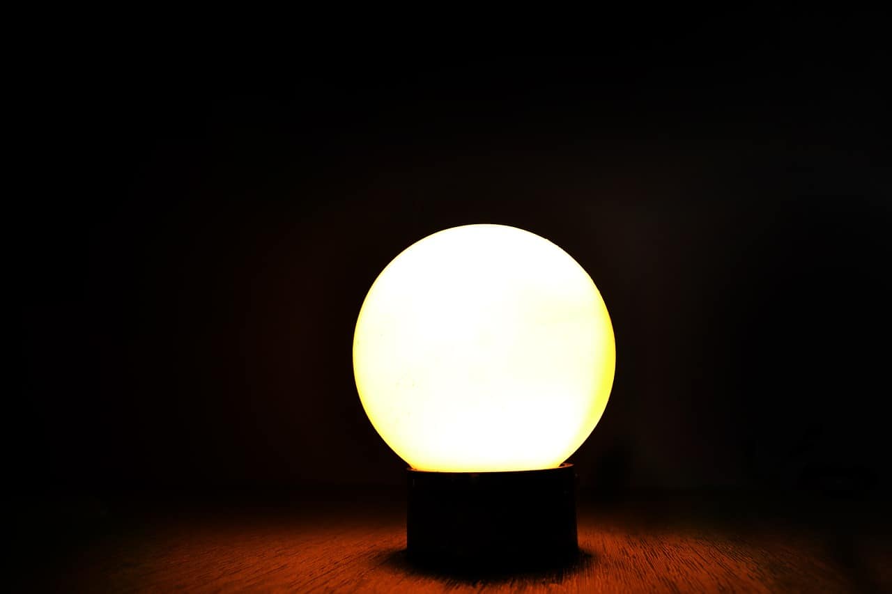 A lamp that is sitting in the dark