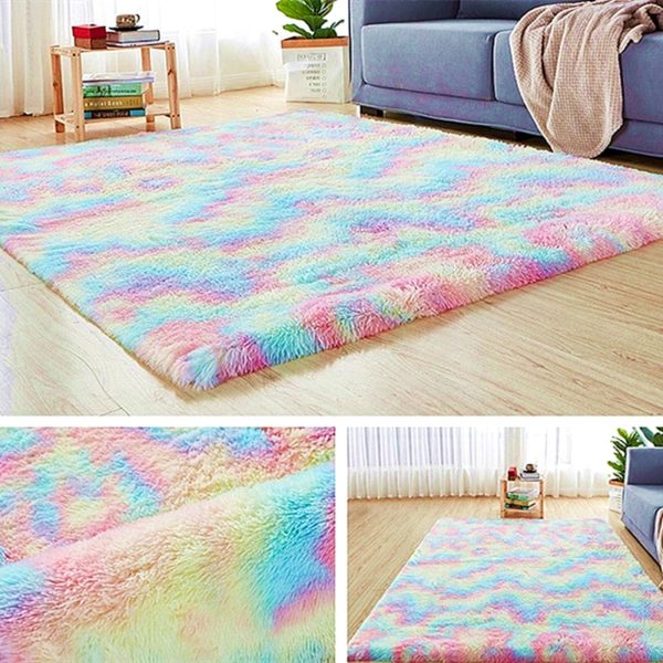 A bed with a colorful rug
